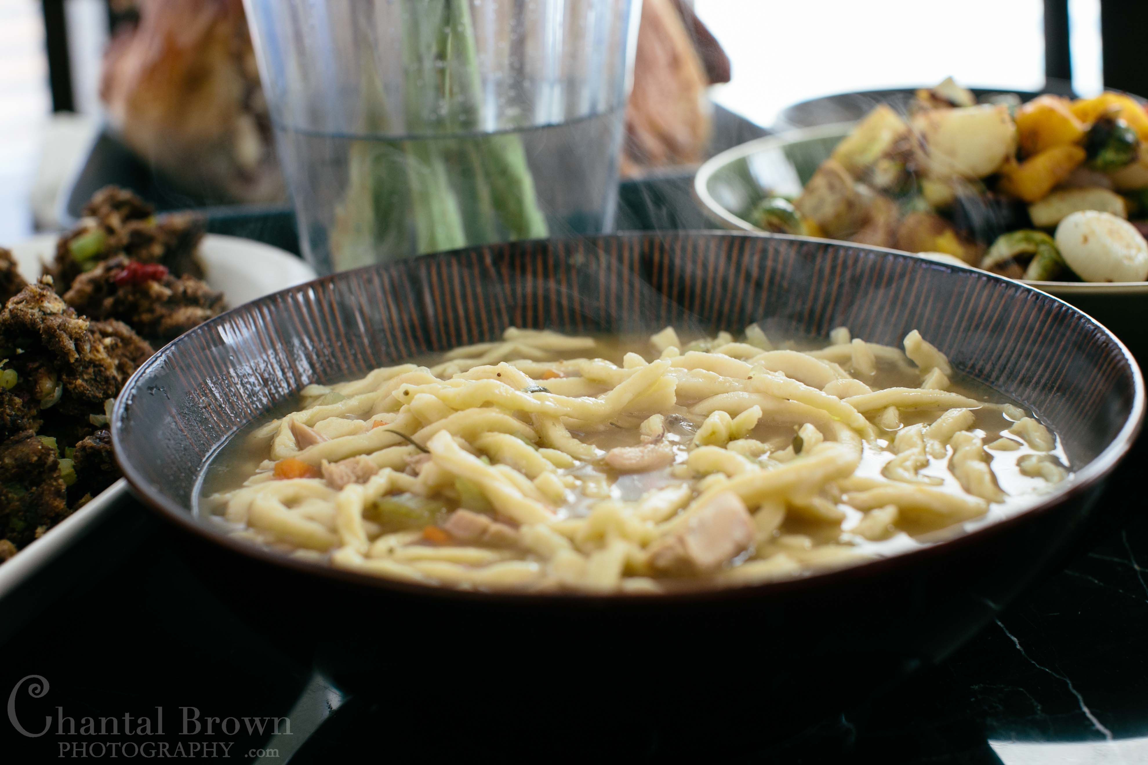 Making homemade noodle soup for Thanksgiving dinner in Murphy portrait photographer